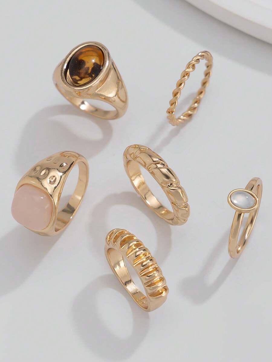 Juego de 13 anillos de metal líquido solar con textura asimétrica fluida o martillada