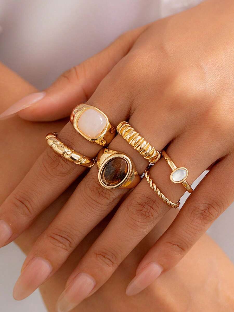 Juego de 13 anillos de metal líquido solar con textura asimétrica fluida o martillada
