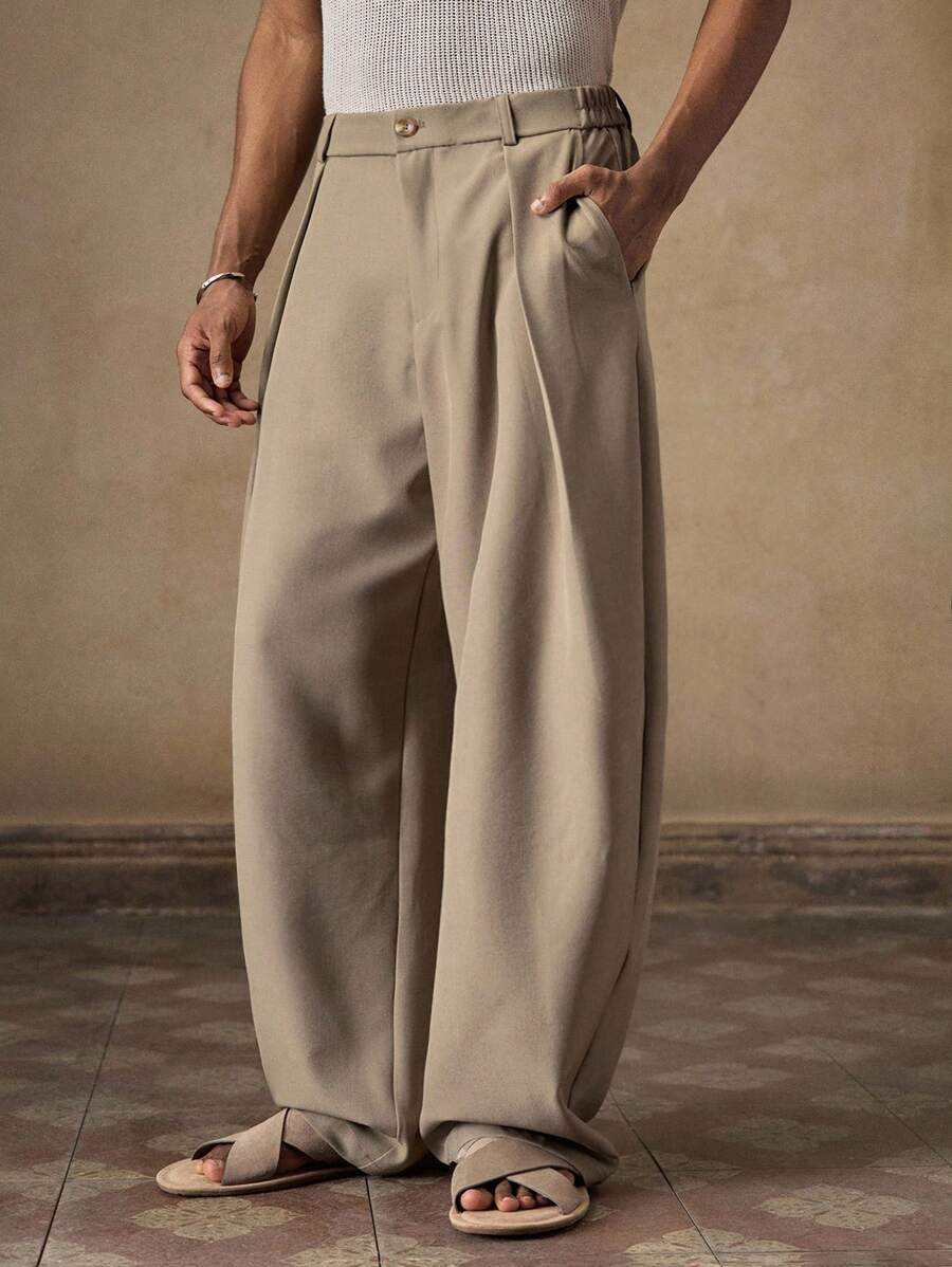 Pantalones de cintura alta y pierna ancha para hombre con frente plisado