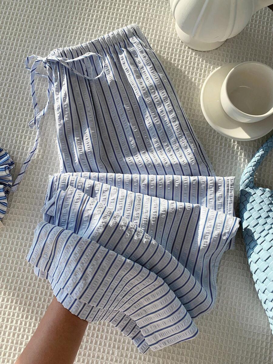 Pantalones casuales con estampado a cuadros para mujer.
