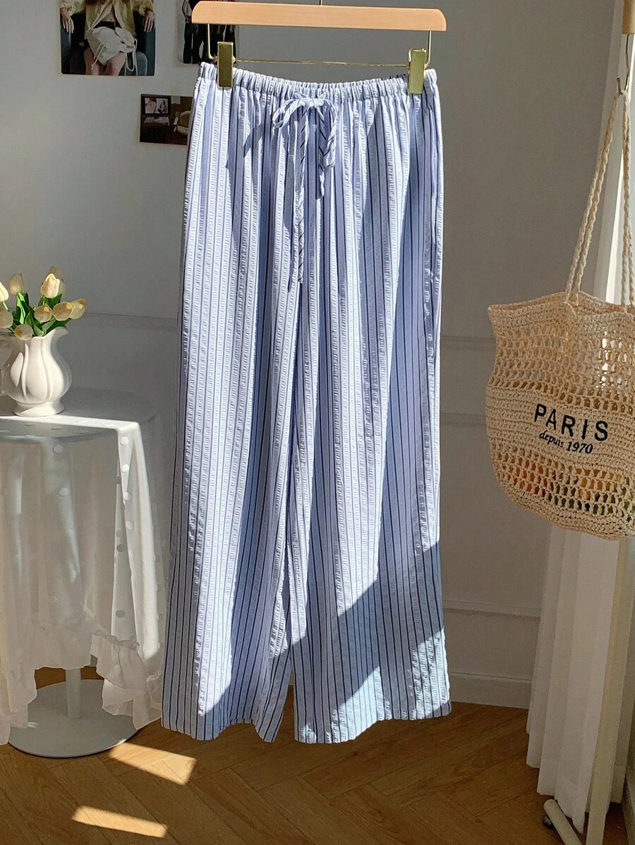 Pantalones casuales con estampado a cuadros para mujer.
