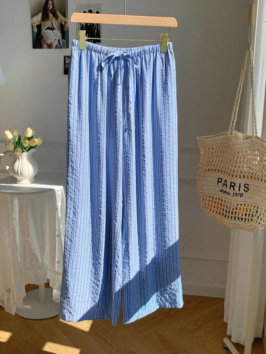 Pantalones casuales con estampado a cuadros para mujer.
