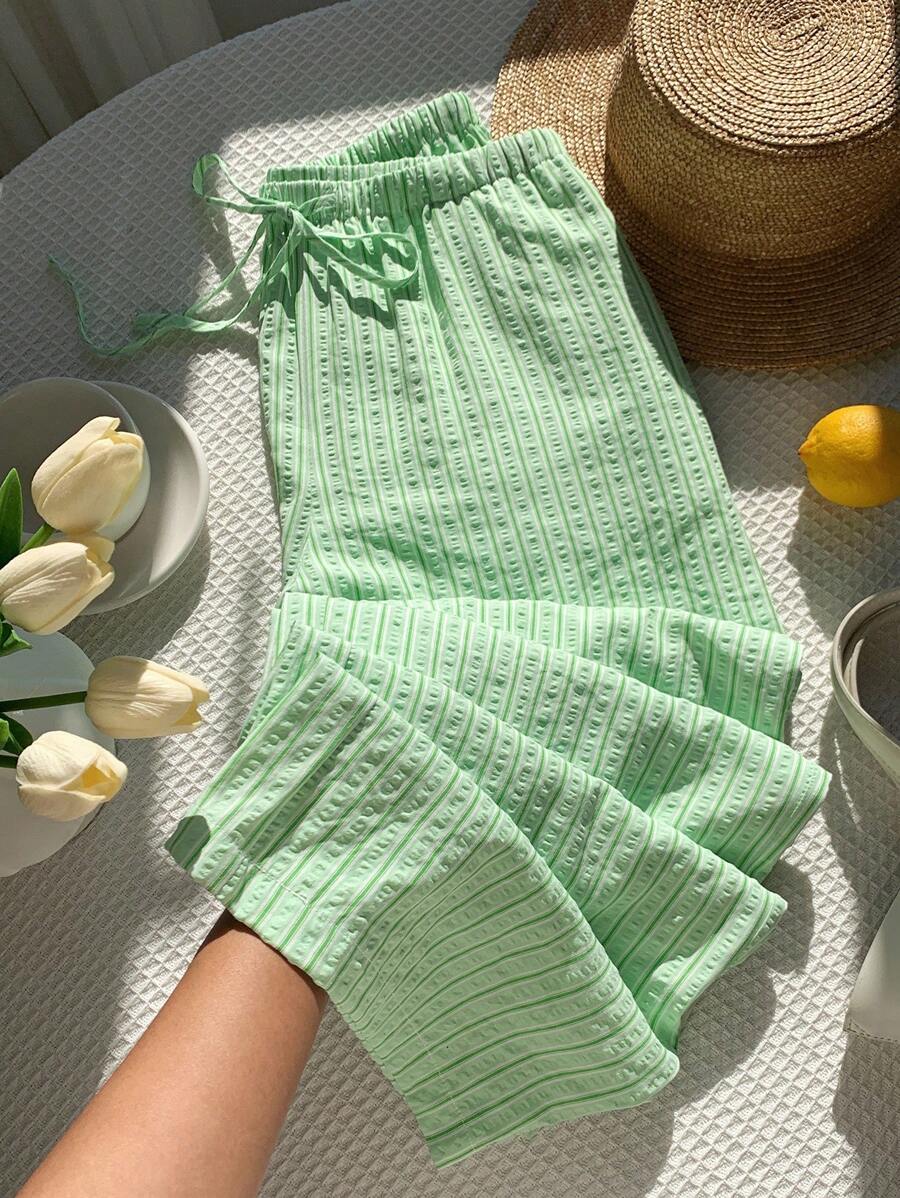 Pantalones casuales con estampado a cuadros para mujer.