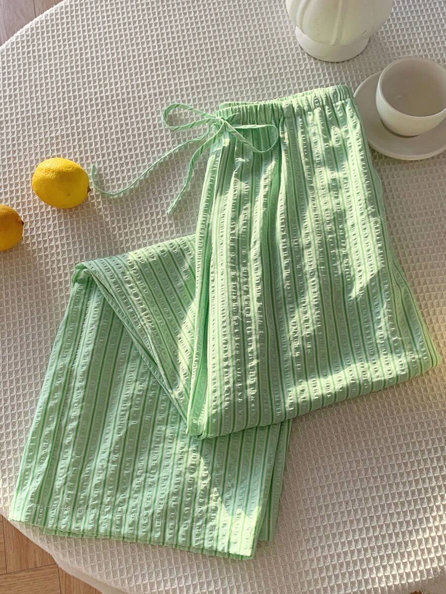 Pantalones casuales con estampado a cuadros para mujer.