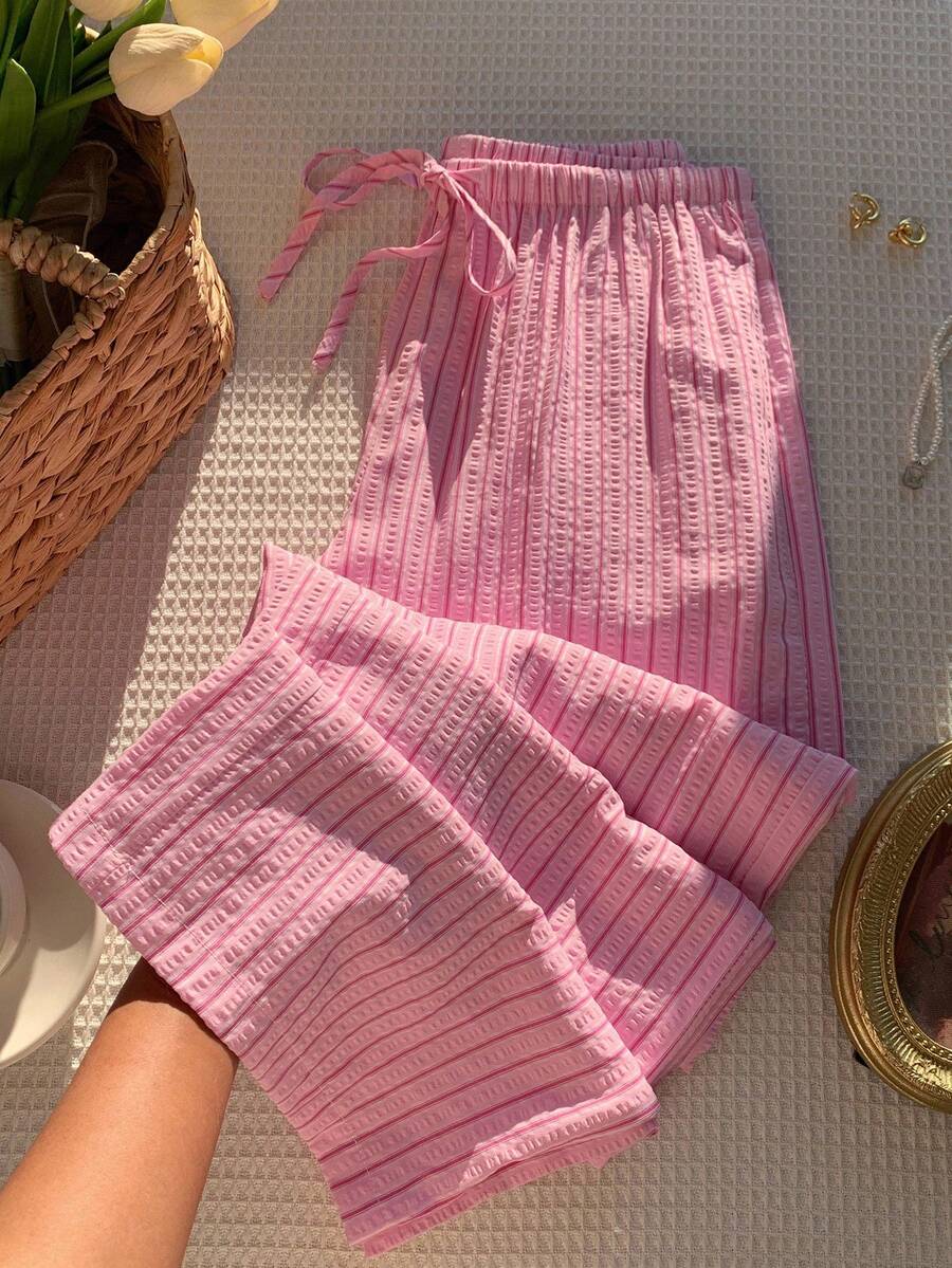 Pantalones casuales con estampado a cuadros para mujer.