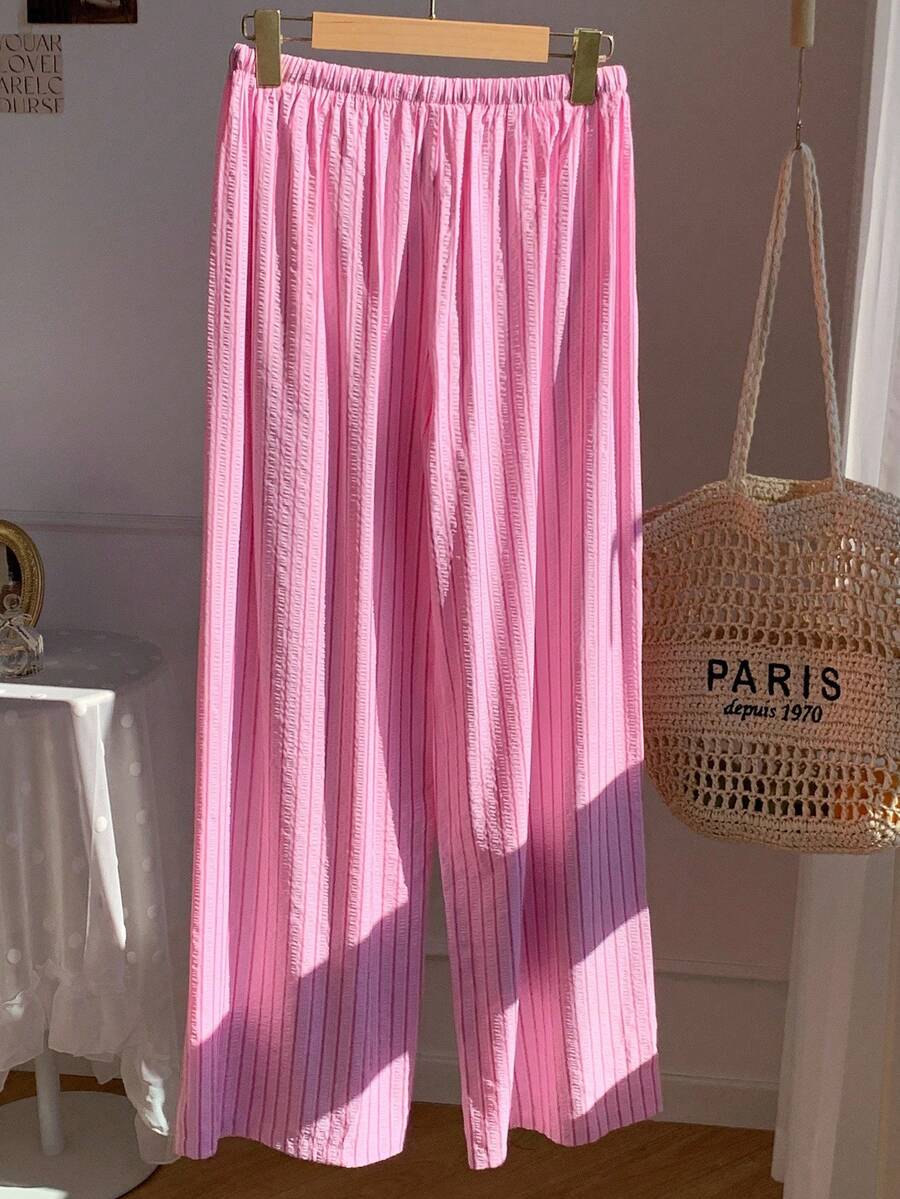 Pantalones casuales con estampado a cuadros para mujer.