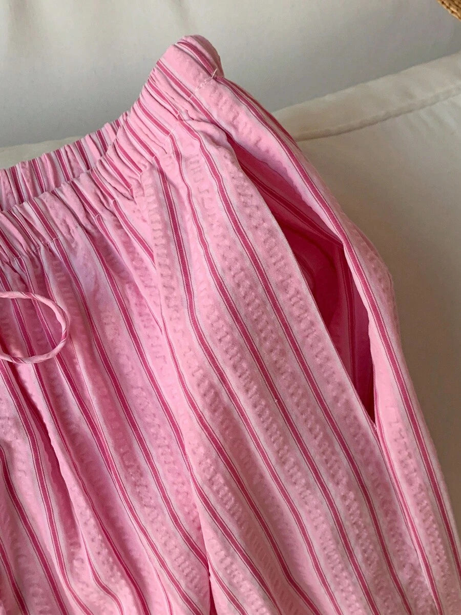 Pantalones casuales con estampado a cuadros para mujer.