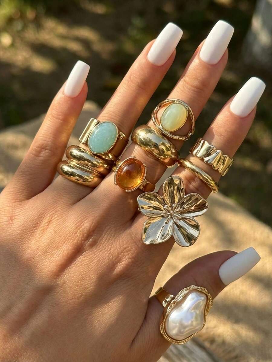 Juego de 13 anillos de metal líquido solar con textura asimétrica fluida o martillada