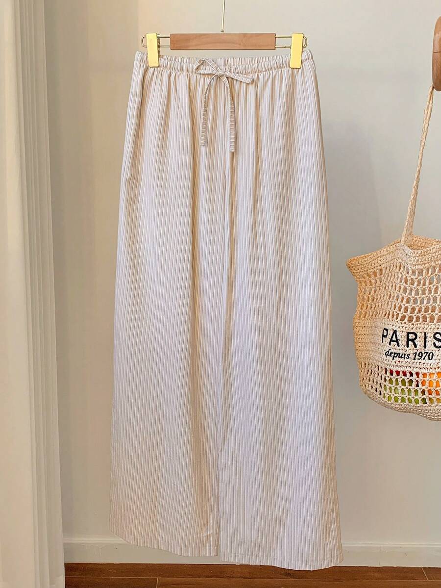Pantalones casuales con estampado a cuadros para mujer.