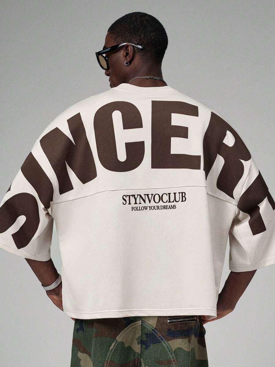 Camiseta suelta de hombro caído con estampado de letras casual para hombre