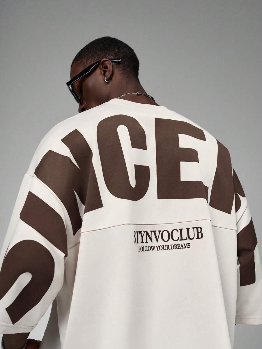 Camiseta suelta de hombro caído con estampado de letras casual para hombre