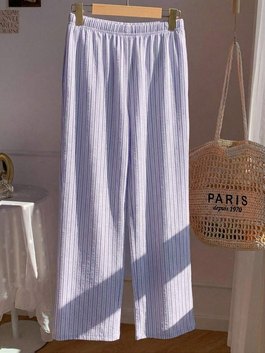 Pantalones casuales con estampado a cuadros para mujer.