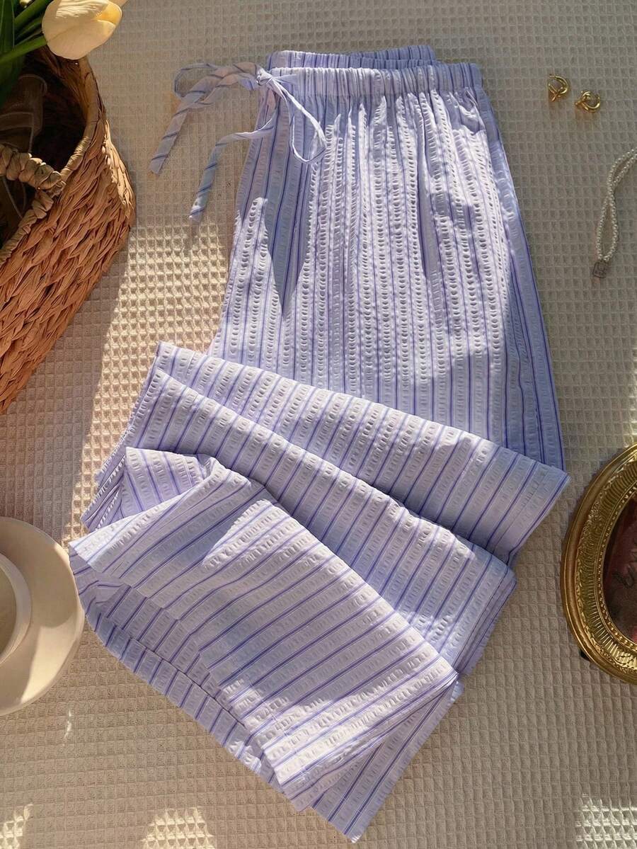Pantalones casuales con estampado a cuadros para mujer.