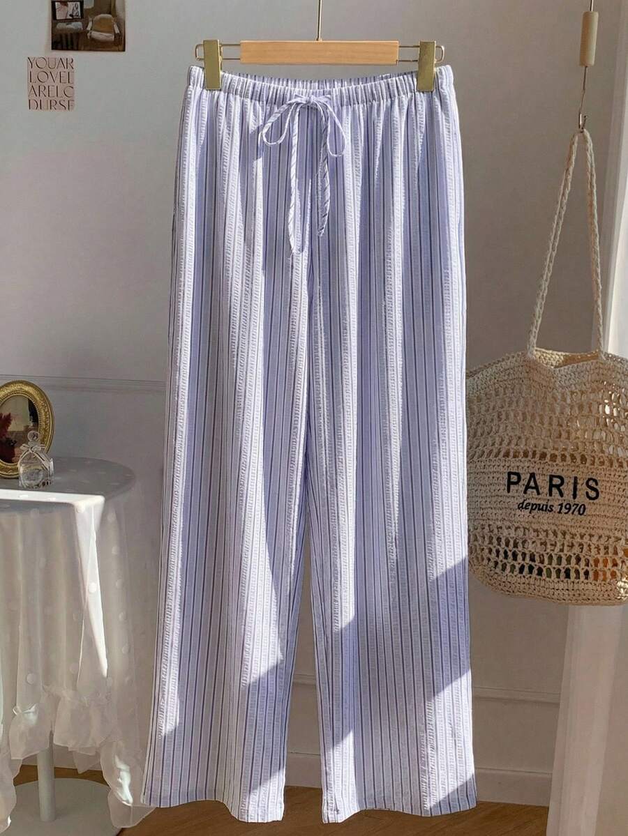 Pantalones casuales con estampado a cuadros para mujer.