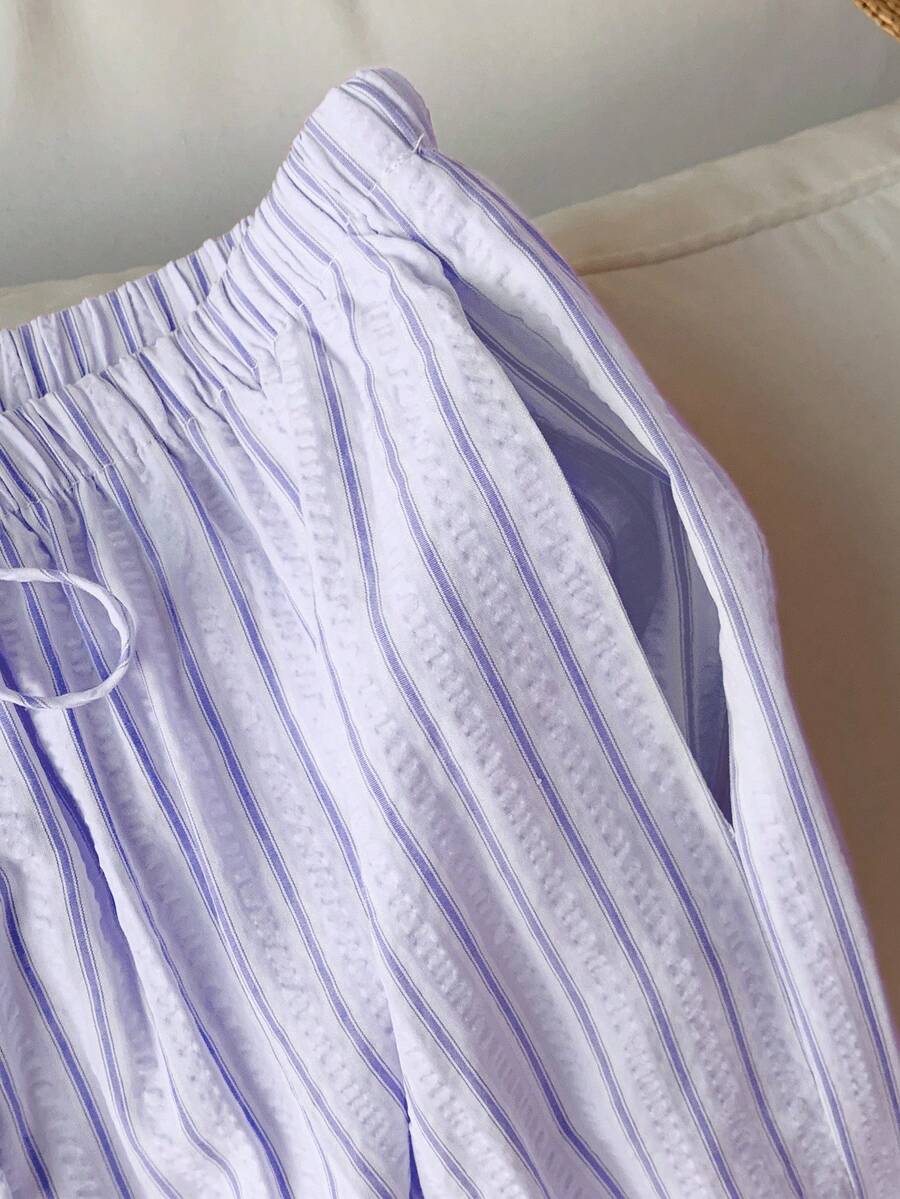 Pantalones casuales con estampado a cuadros para mujer.