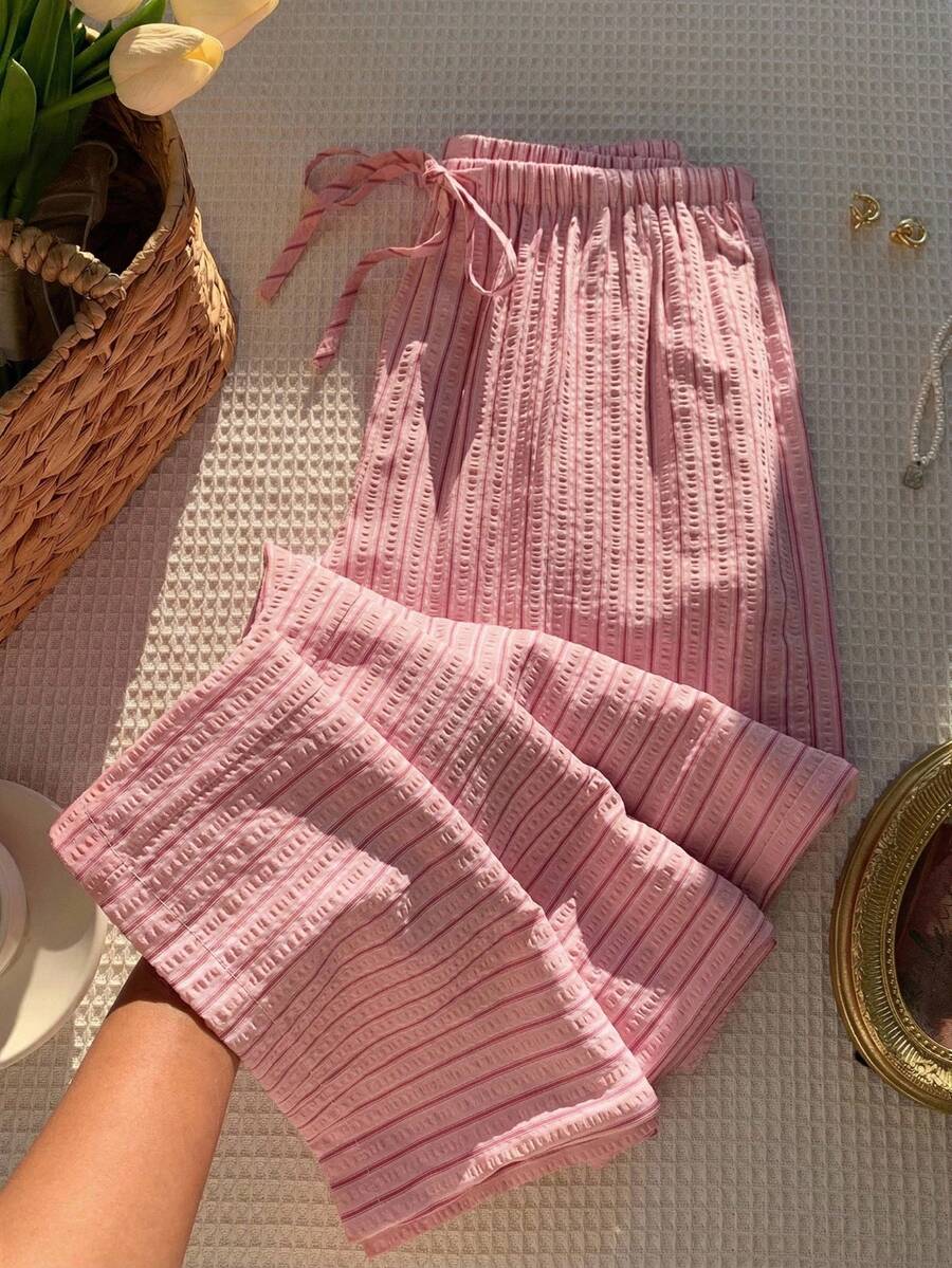 Pantalones casuales con estampado a cuadros para mujer.