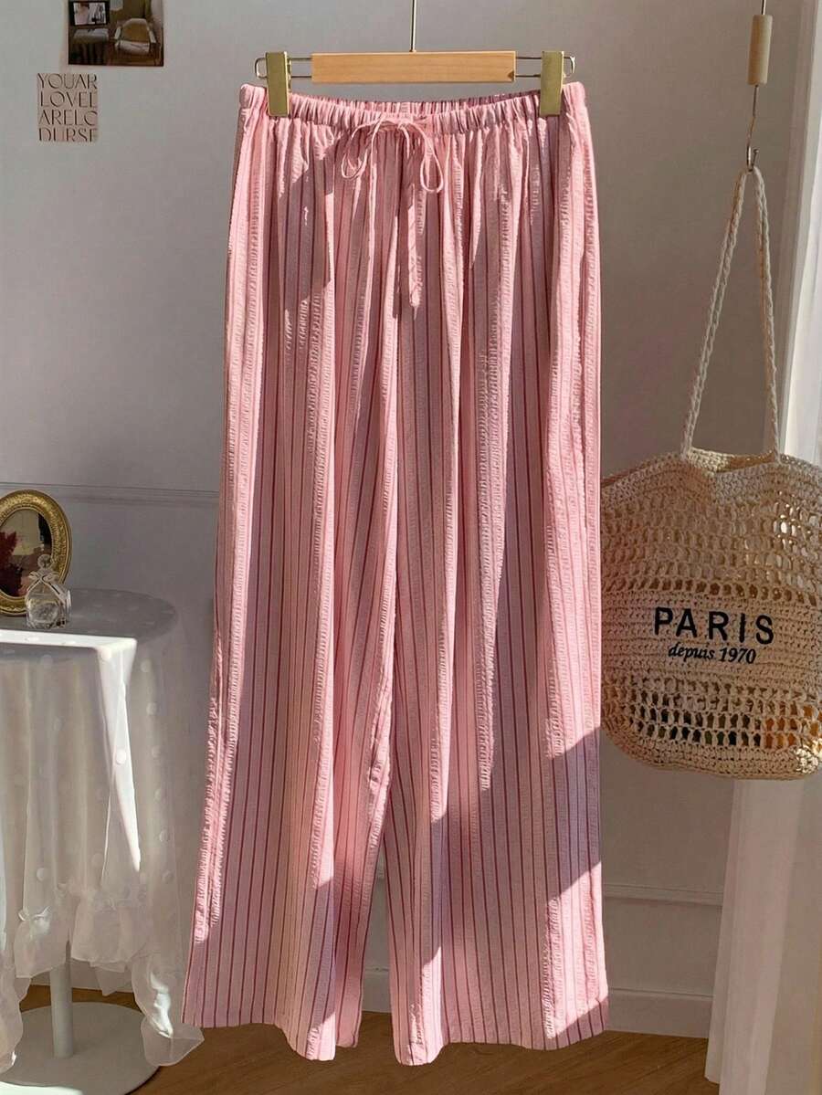 Pantalones casuales con estampado a cuadros para mujer.