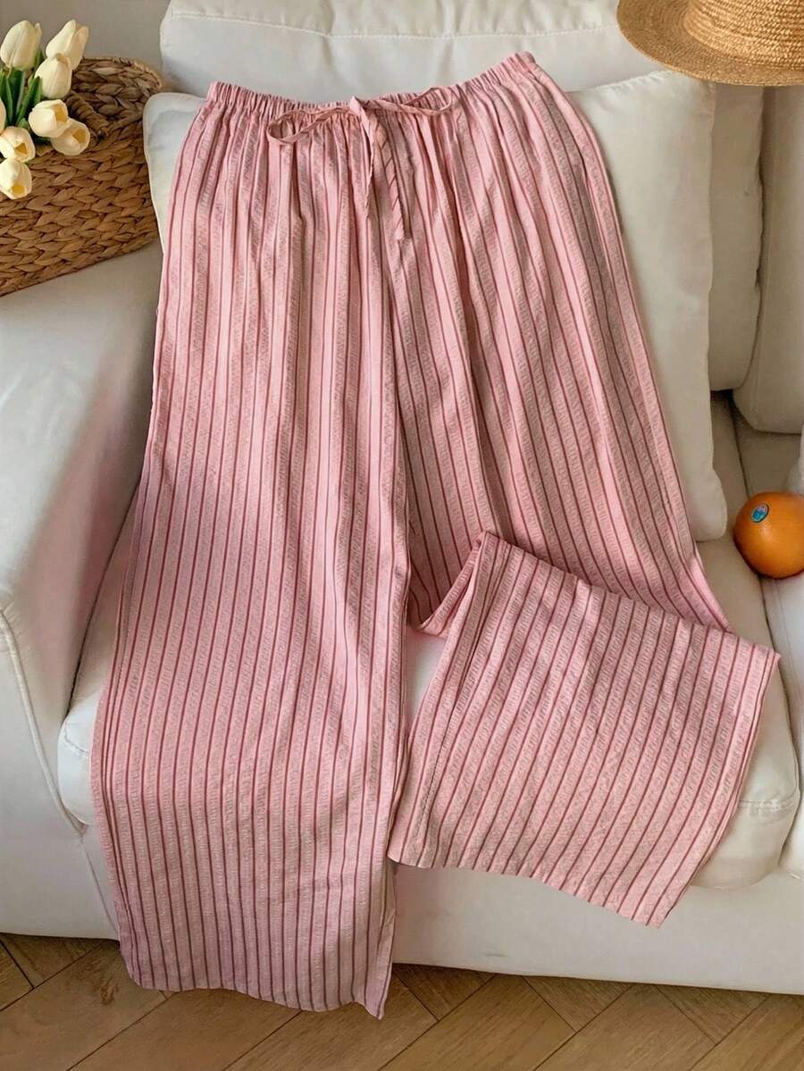 Pantalones casuales con estampado a cuadros para mujer.
