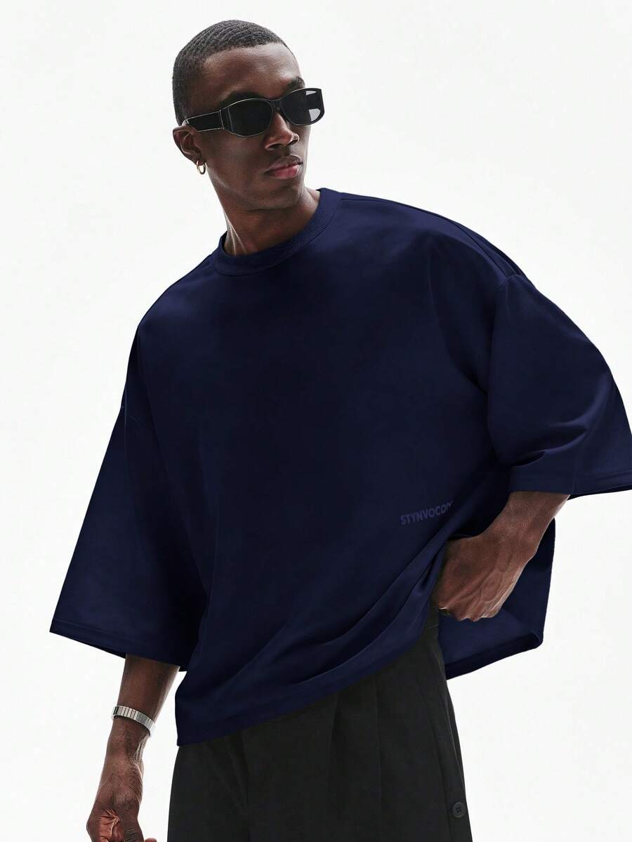 Camiseta suelta de hombro caído con estampado de letras casual para hombre