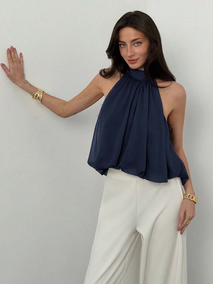 Blusa de verano casual de mujer con estampado de lunares y escote halter