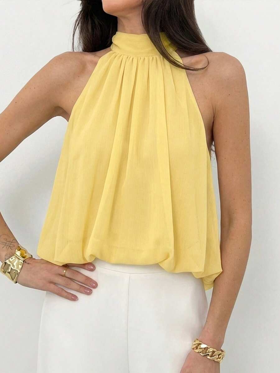 Blusa de verano casual de mujer con estampado de lunares y escote halter