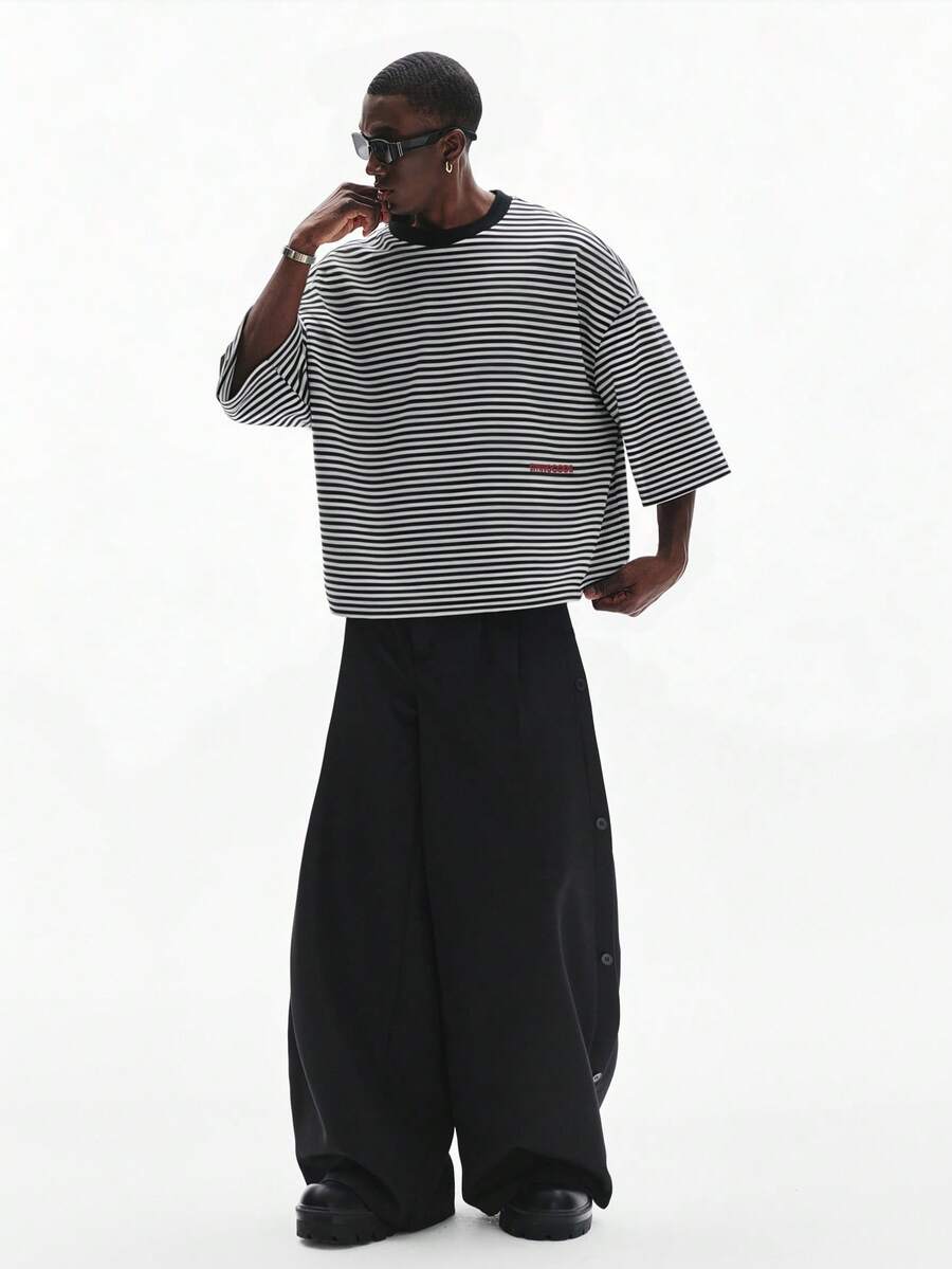 Camiseta suelta de hombro caído con estampado de letras casual para hombre