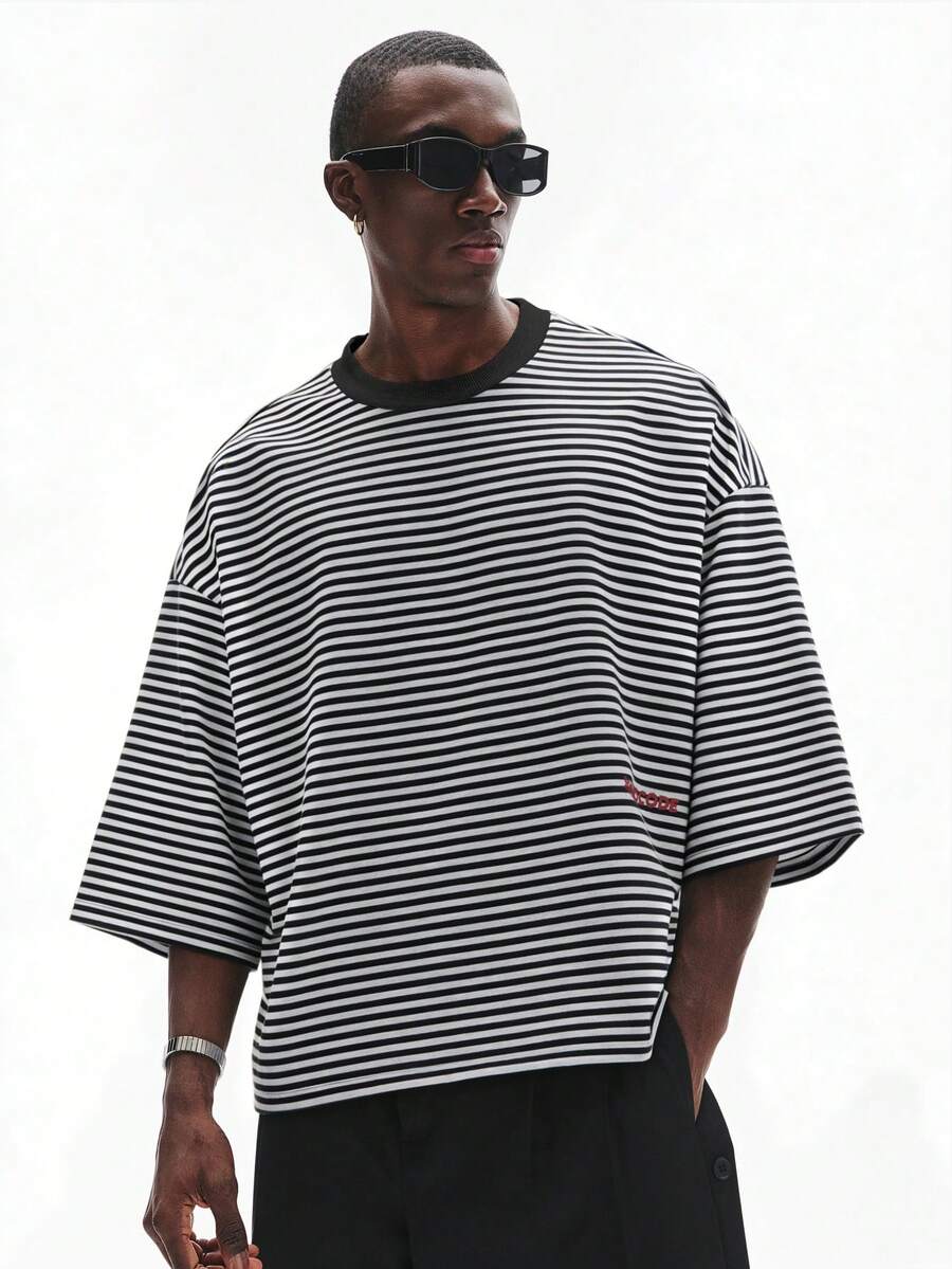 Camiseta suelta de hombro caído con estampado de letras casual para hombre