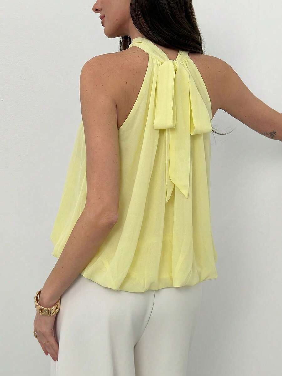 Blusa de verano casual de mujer con estampado de lunares y escote halter