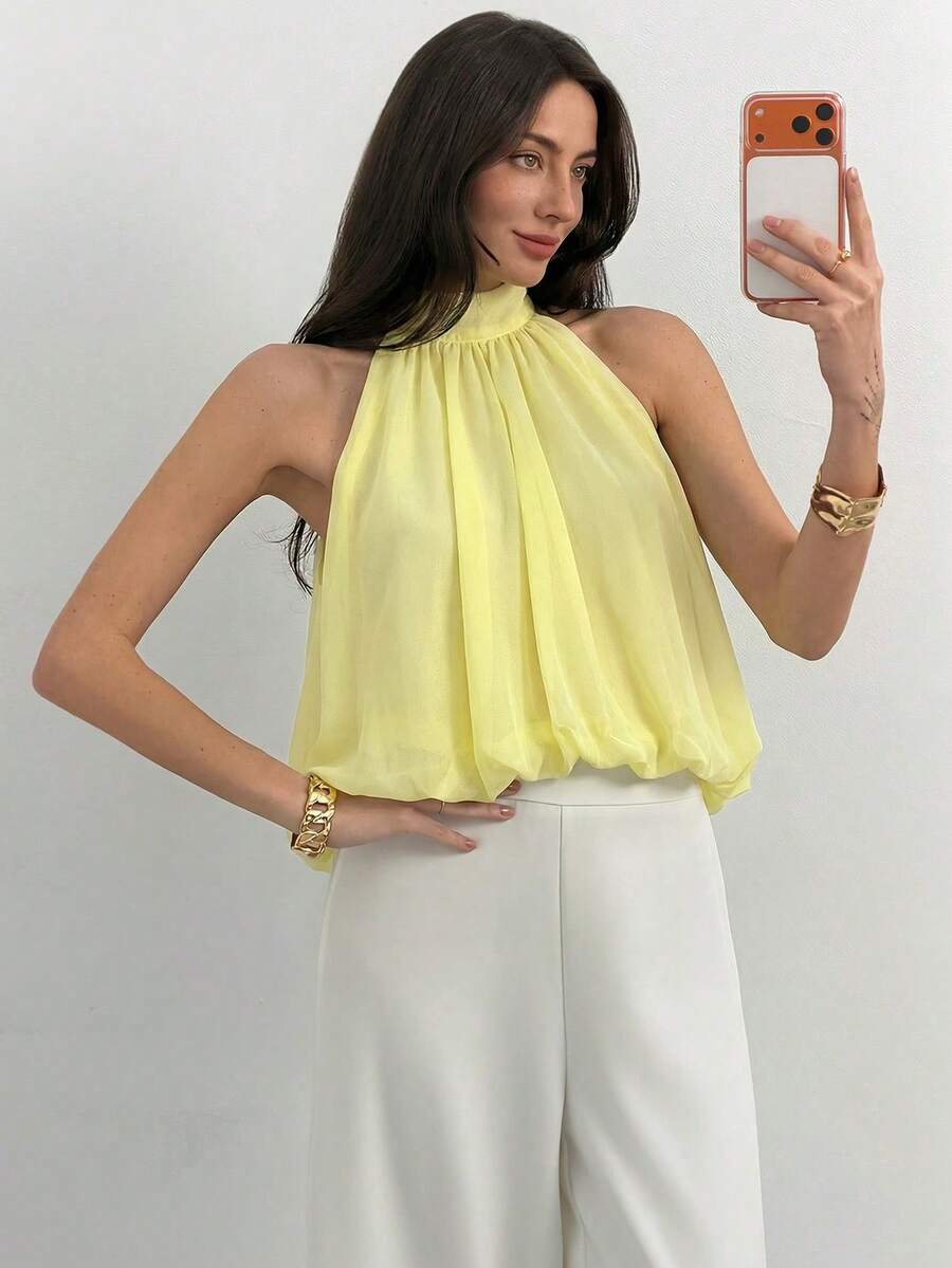 Blusa de verano casual de mujer con estampado de lunares y escote halter