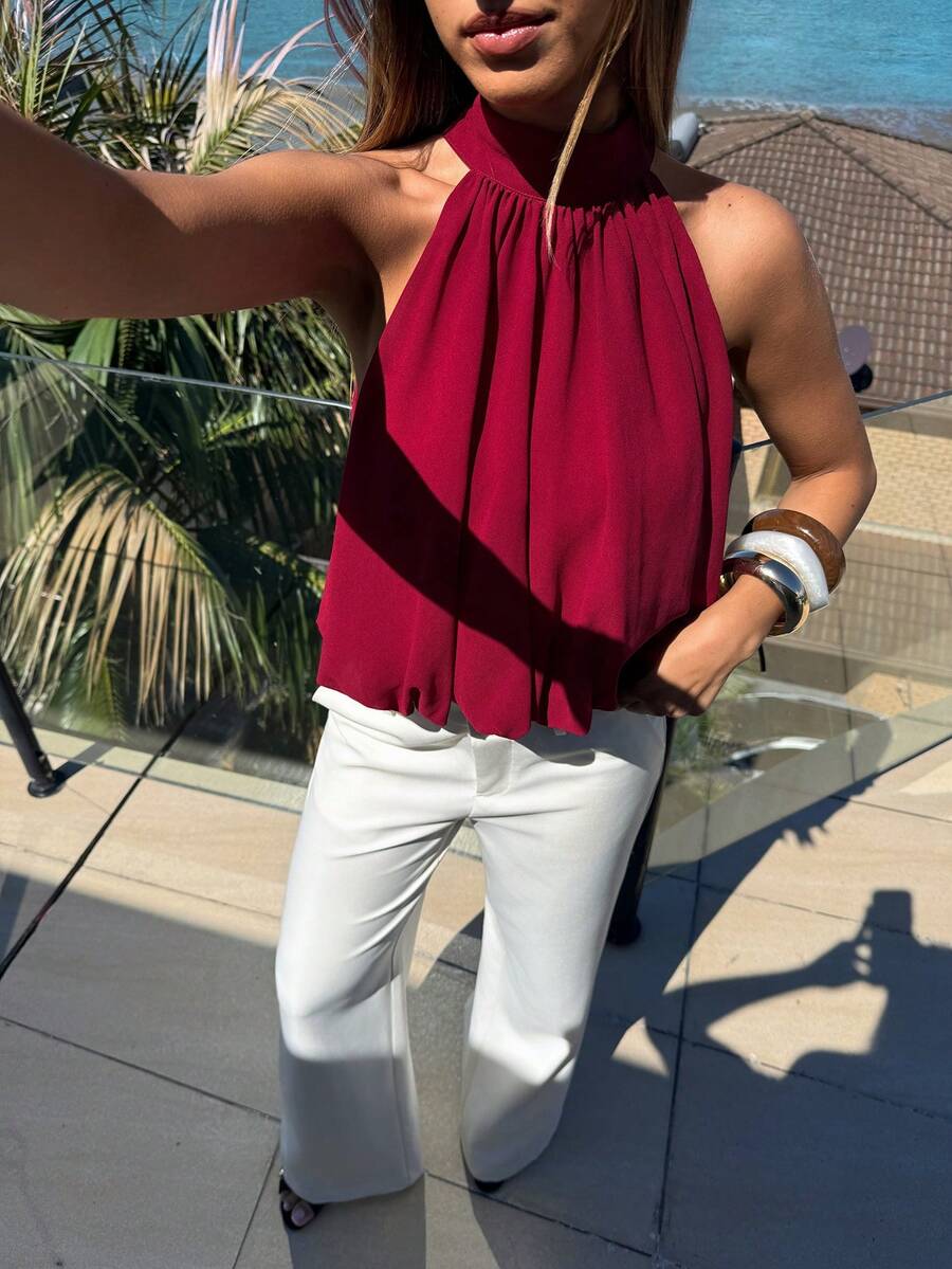 Blusa de verano casual de mujer con estampado de lunares y escote halter