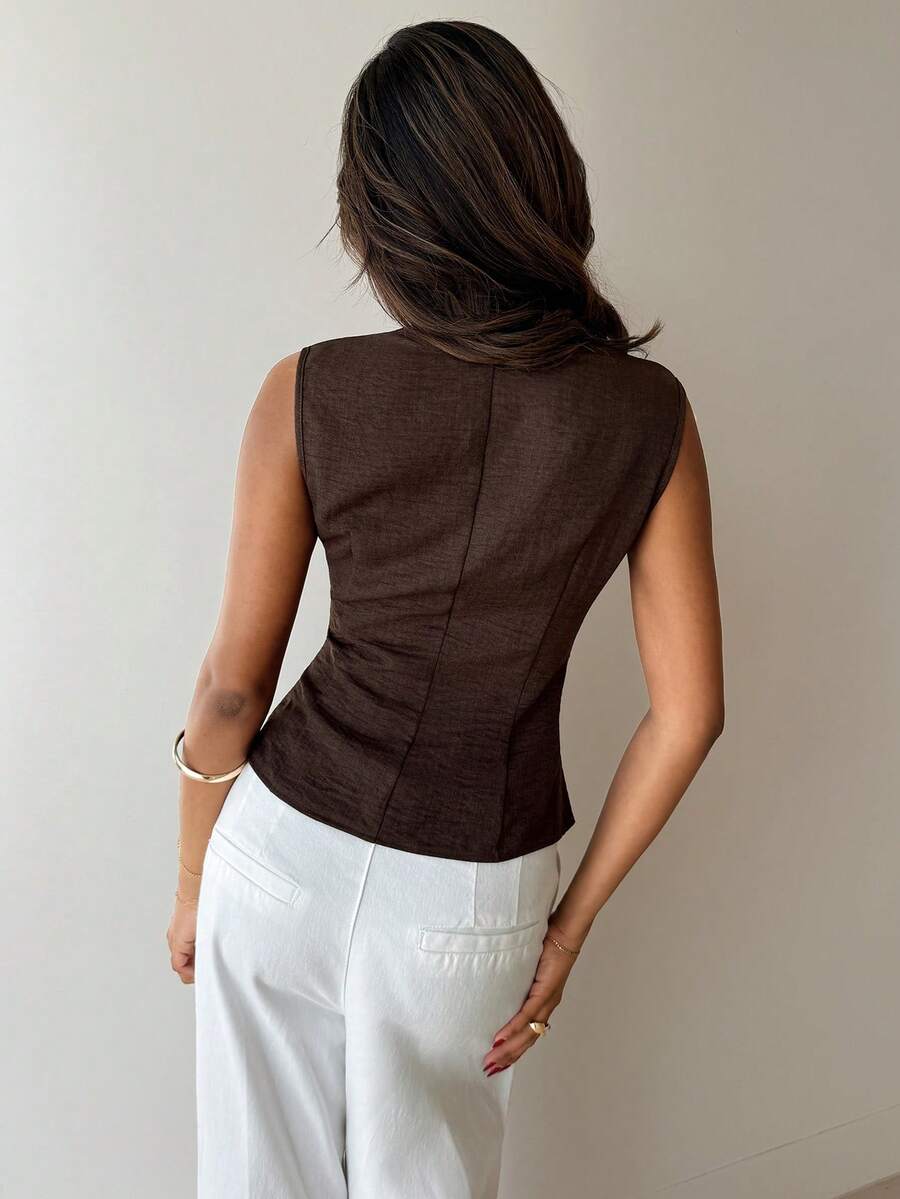 Nueva blusa minimalista de moda con cuello en V asimétrico