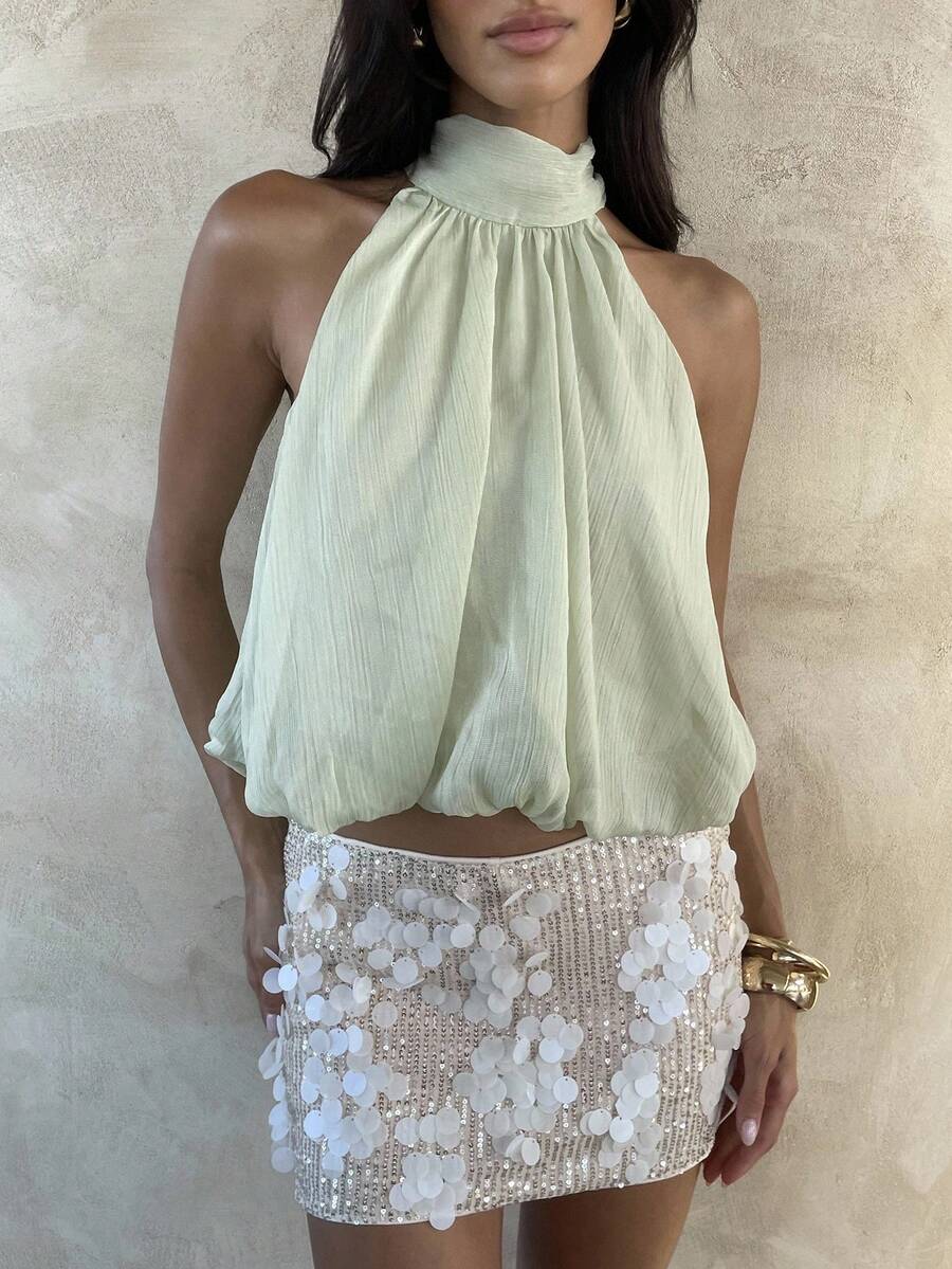 Blusa de verano casual de mujer con estampado de lunares y escote halter