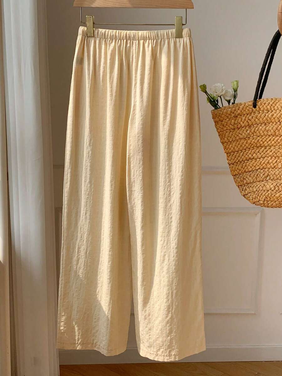 Pantalones casuales con estampado a cuadros para mujer.