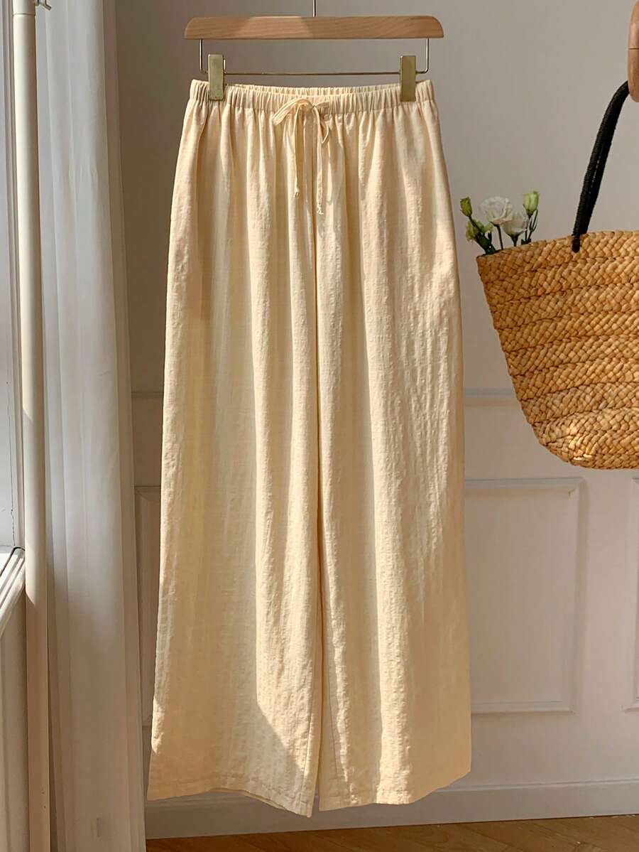 Pantalones casuales con estampado a cuadros para mujer.