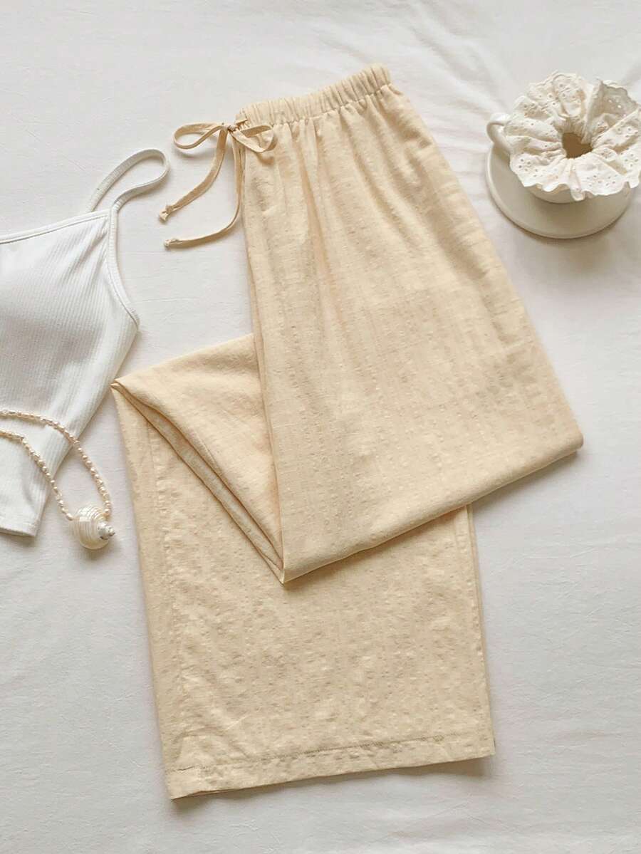 Pantalones casuales con estampado a cuadros para mujer.