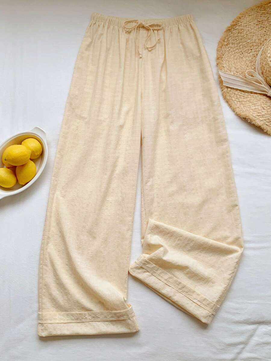 Pantalones casuales con estampado a cuadros para mujer.