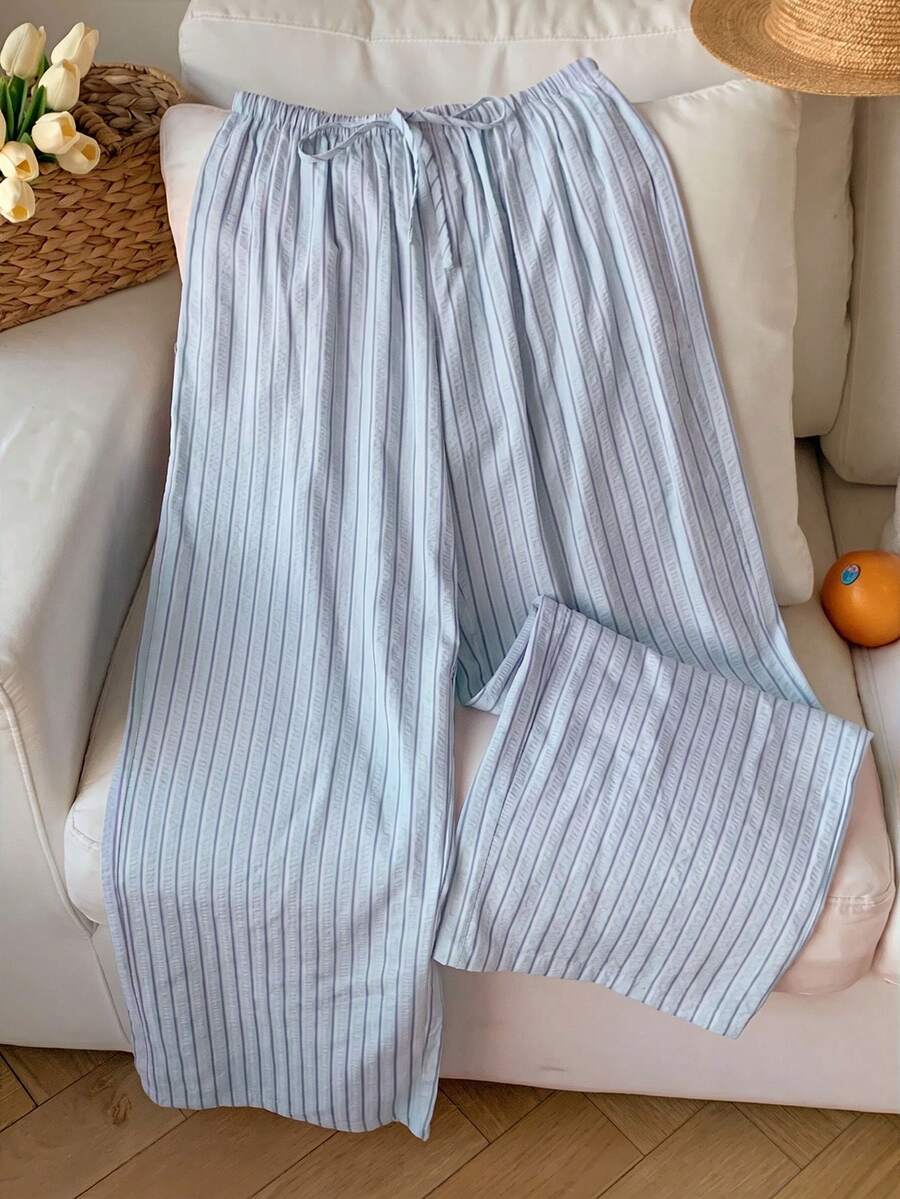 Pantalones casuales con estampado a cuadros para mujer.