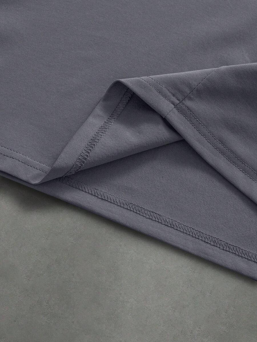 Camiseta suelta de hombro caído con estampado de letras casual para hombre