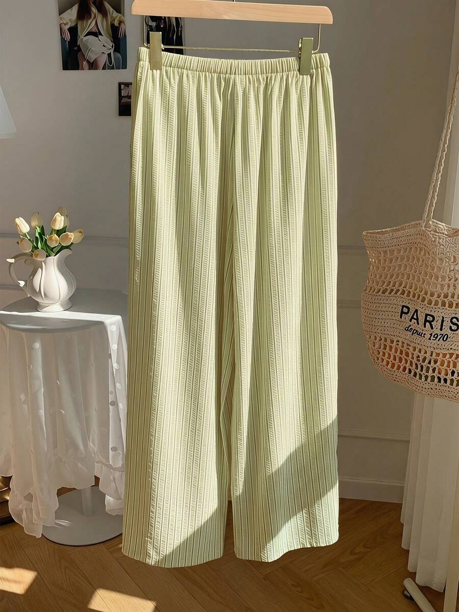 Pantalones casuales con estampado a cuadros para mujer.