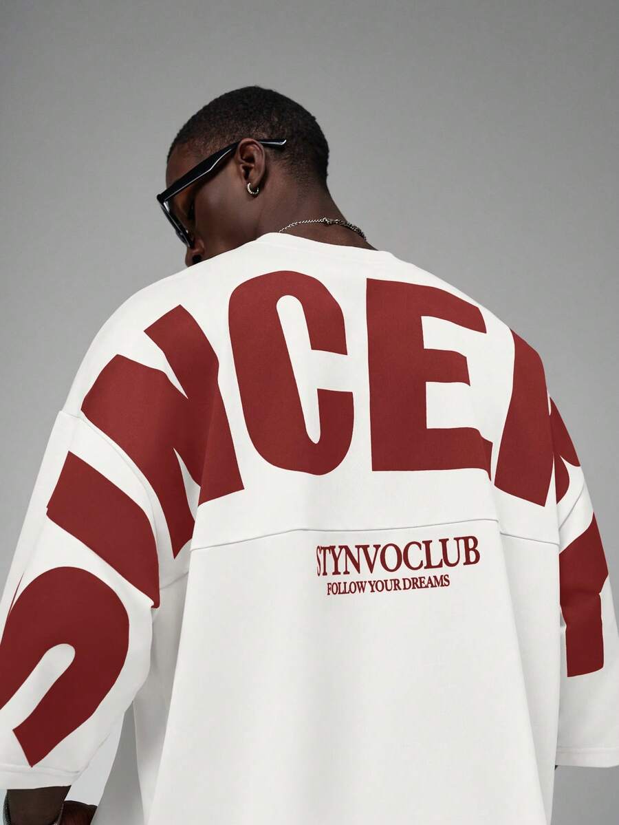 Camiseta suelta de hombro caído con estampado de letras casual para hombre