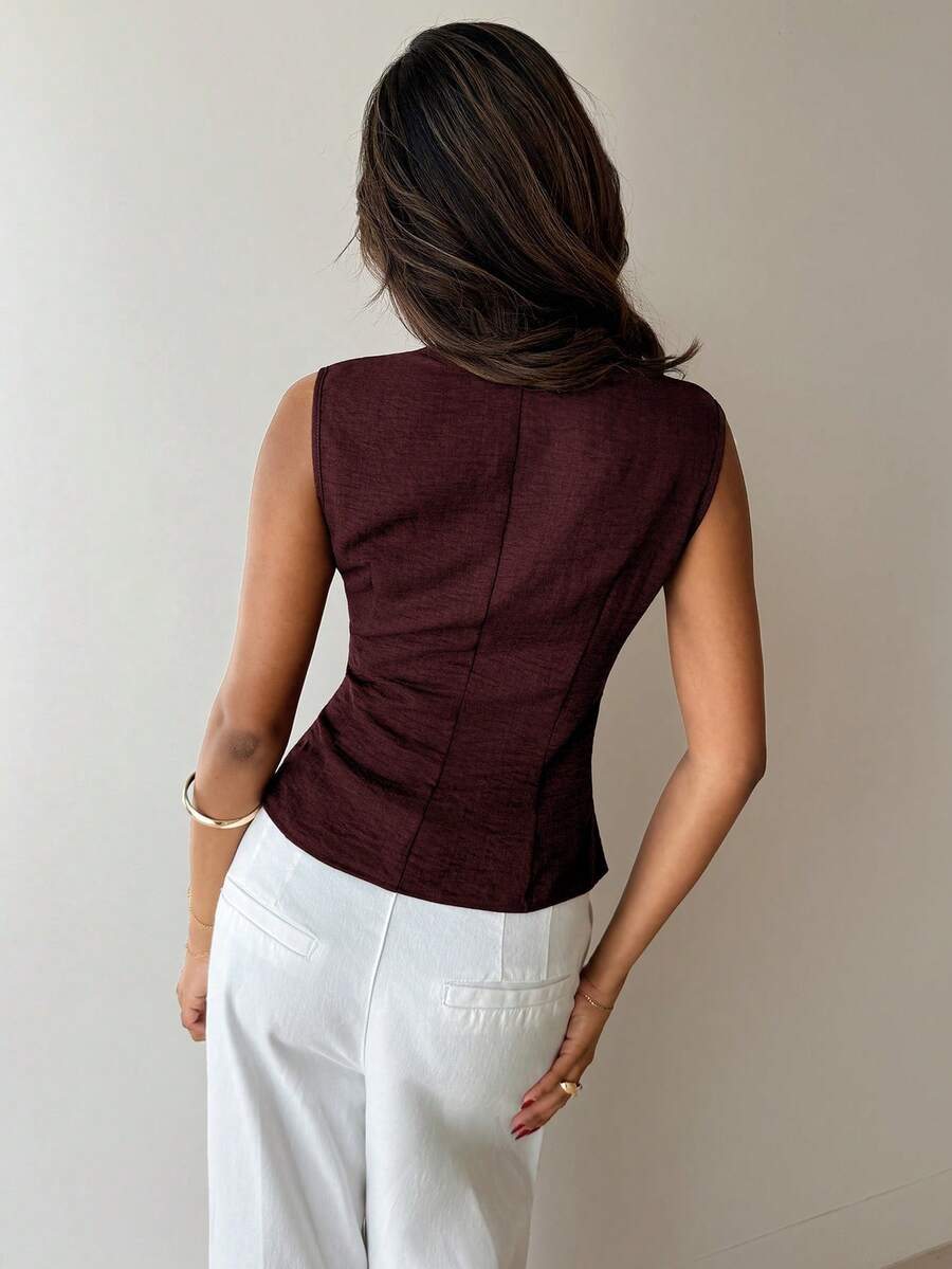 Nueva blusa minimalista de moda con cuello en V asimétrico