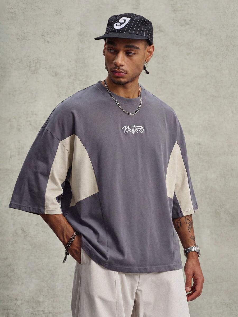 Camiseta suelta de hombro caído con estampado de letras casual para hombre