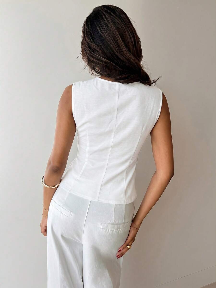 Nueva blusa minimalista de moda con cuello en V asimétrico