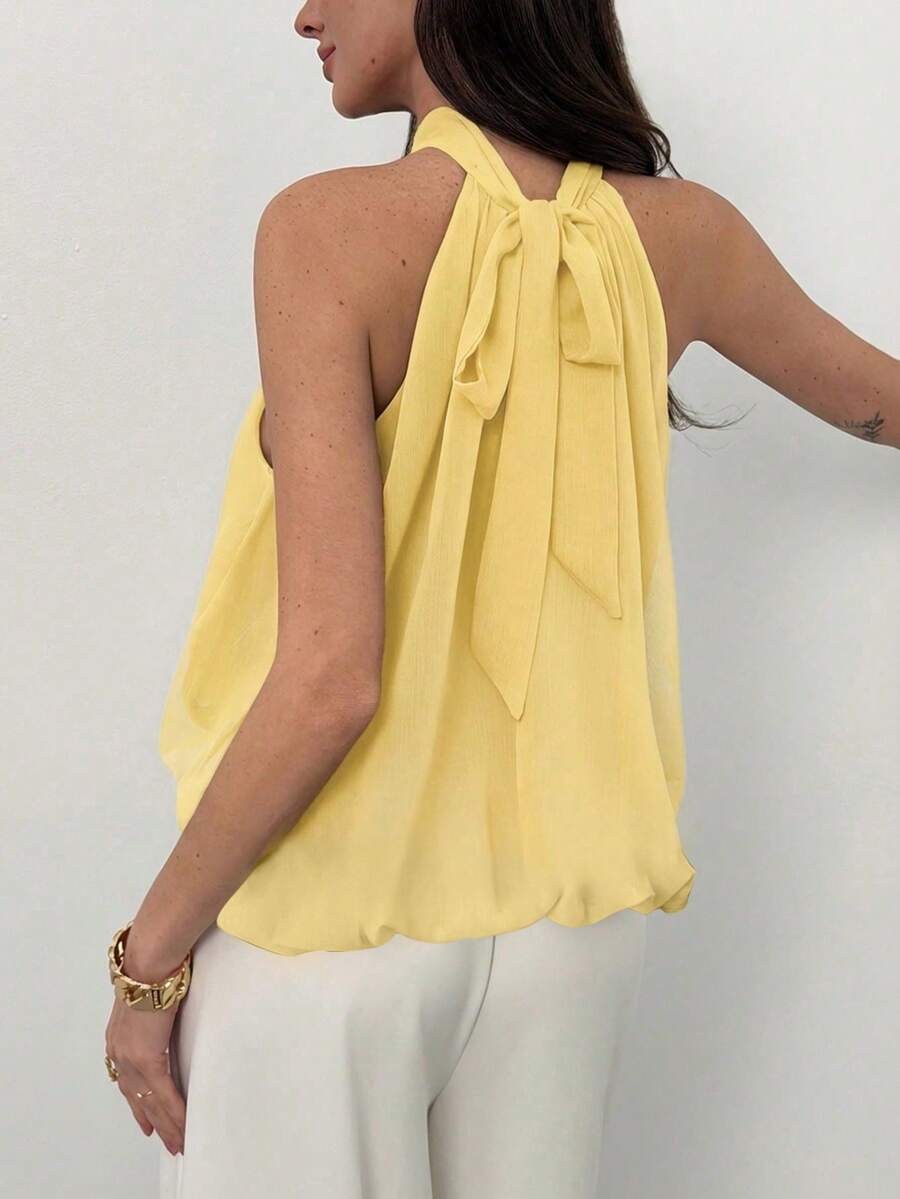 Blusa de verano casual de mujer con estampado de lunares y escote halter