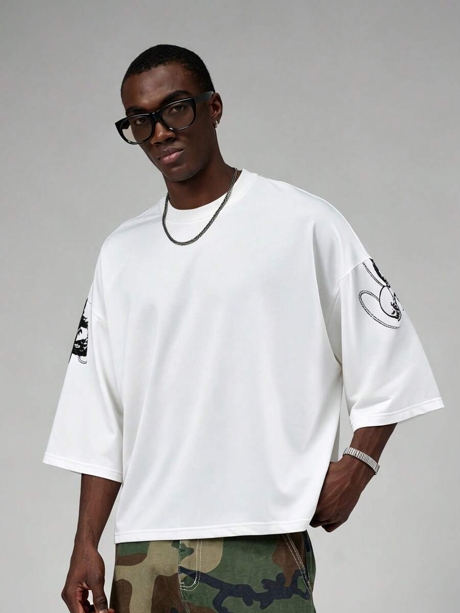 Camiseta suelta de hombro caído con estampado de letras casual para hombre