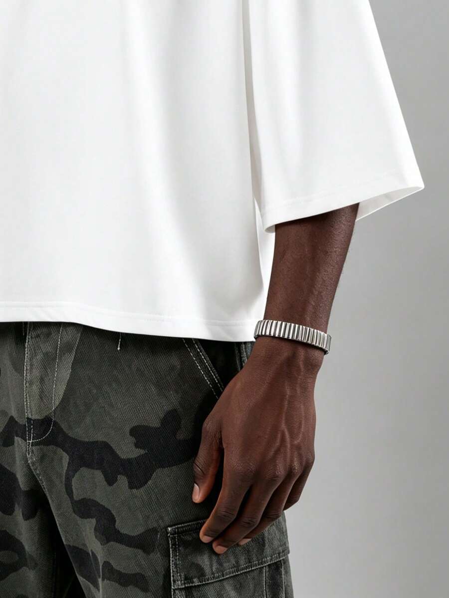 Camiseta suelta de hombro caído con estampado de letras casual para hombre