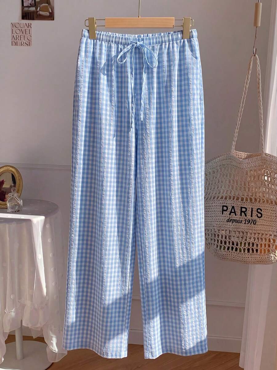 Pantalones casuales con estampado a cuadros para mujer.