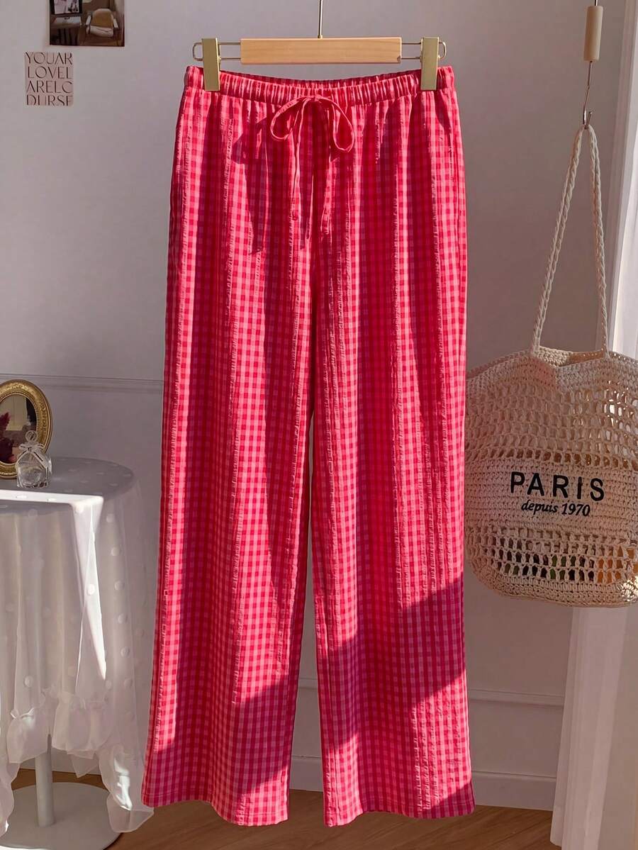 Pantalones casuales con estampado a cuadros para mujer.