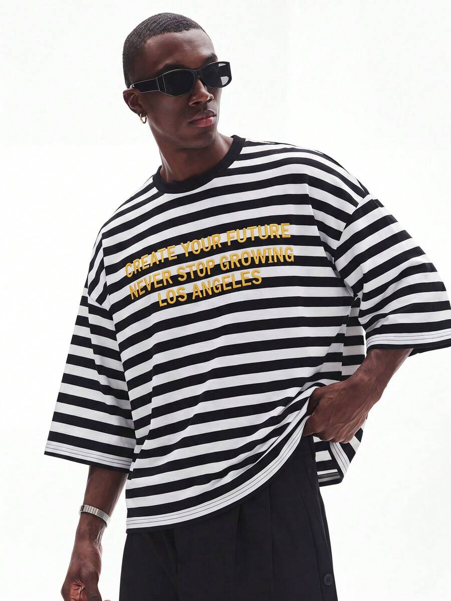 Camiseta suelta de hombro caído con estampado de letras casual para hombre