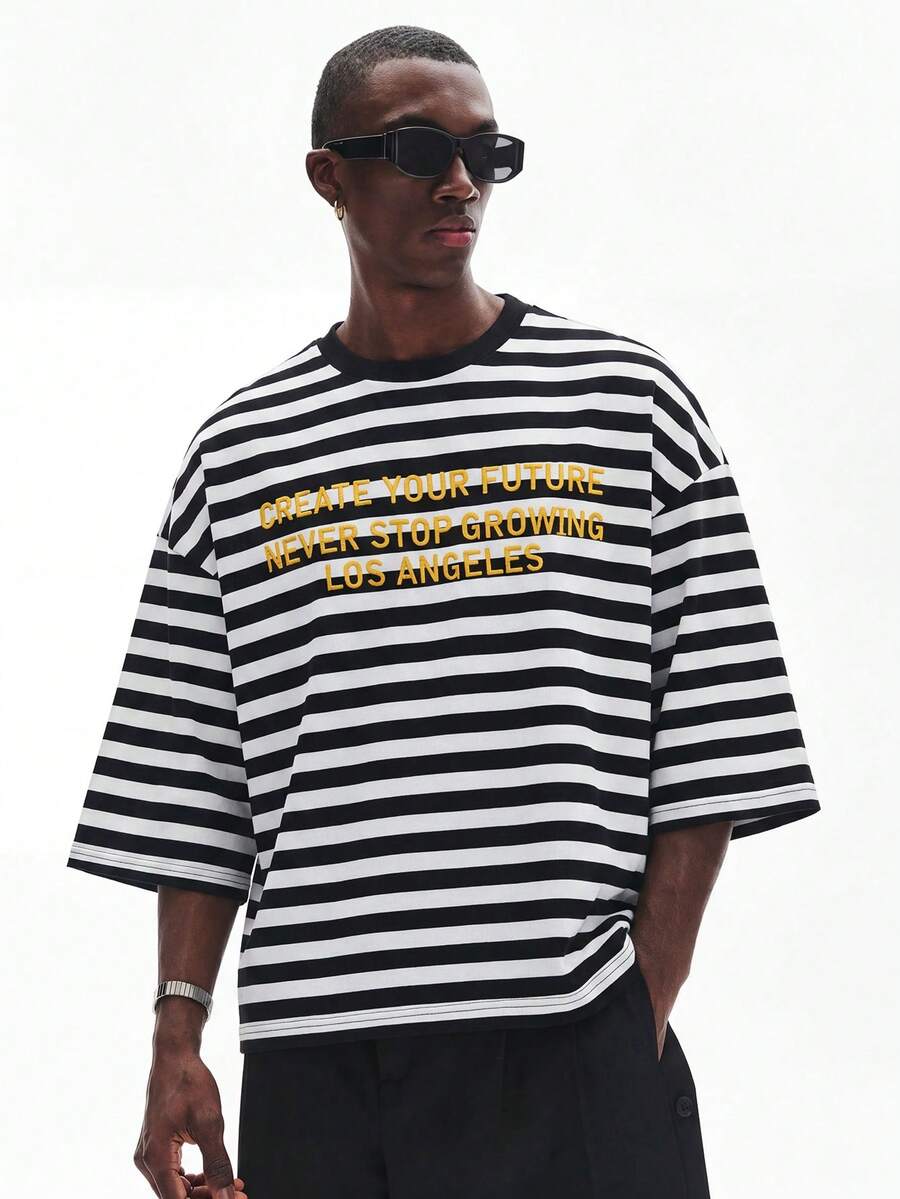 Camiseta suelta de hombro caído con estampado de letras casual para hombre